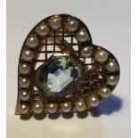 A FRENCH YELLOW METAL, PEAR AND AQUAMARINE HEART FORM RING Having a row of twenty seed pearls and