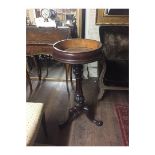 A VICTORIAN MAHOGANY PLANTER The circular top, raised on a turned column with slayer legs. (90cm)