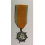 A FRENCH SOCIAL MERIT MEDAL AND RIBBON. Condition: very good enamel
