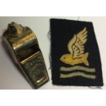 AN AIR MINISTRY WHISTLE Along with 'goldfish' club insignia.