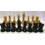 A LATE 19TH/EARLY 20TH CENTURY BOXWOOD AND EBONISED STAUNTON STYLE CHESS SET Complete set bearing