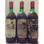 CHÂTEAU DU BARRAIL, 1975, THREE BOTTLES OF VINTAGE BORDEAUX WINE Having red seal caps, bearing label