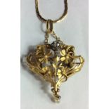A LATE 19TH/EARLY 20TH CENTURY ART NOUVEAU STYLE FRENCH 18CT GOLD AND DIAMOND AND SEED PEARL PENDANT