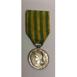 A FRENCH CHINA CAMPAIGN MEDAL AND RIBBON, 1883 - 1885. Condition: very good