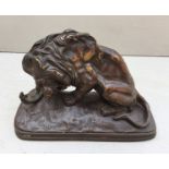 V. CHEMIN, A 19TH CENTURY ANIMALIER BRONZE GROUP OF A LION AND SERPENT Brown patination, signed. (