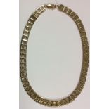 A VINTAGE 9CT GOLD GATE NECKLACE Having five interlocking bars and a hook and eye style clasp. (