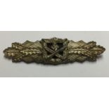 A GERMAN CLOSE COMBAT CLASP WITH SILVER WASH Marked 'Peekhaus Berlin'. Condition: average