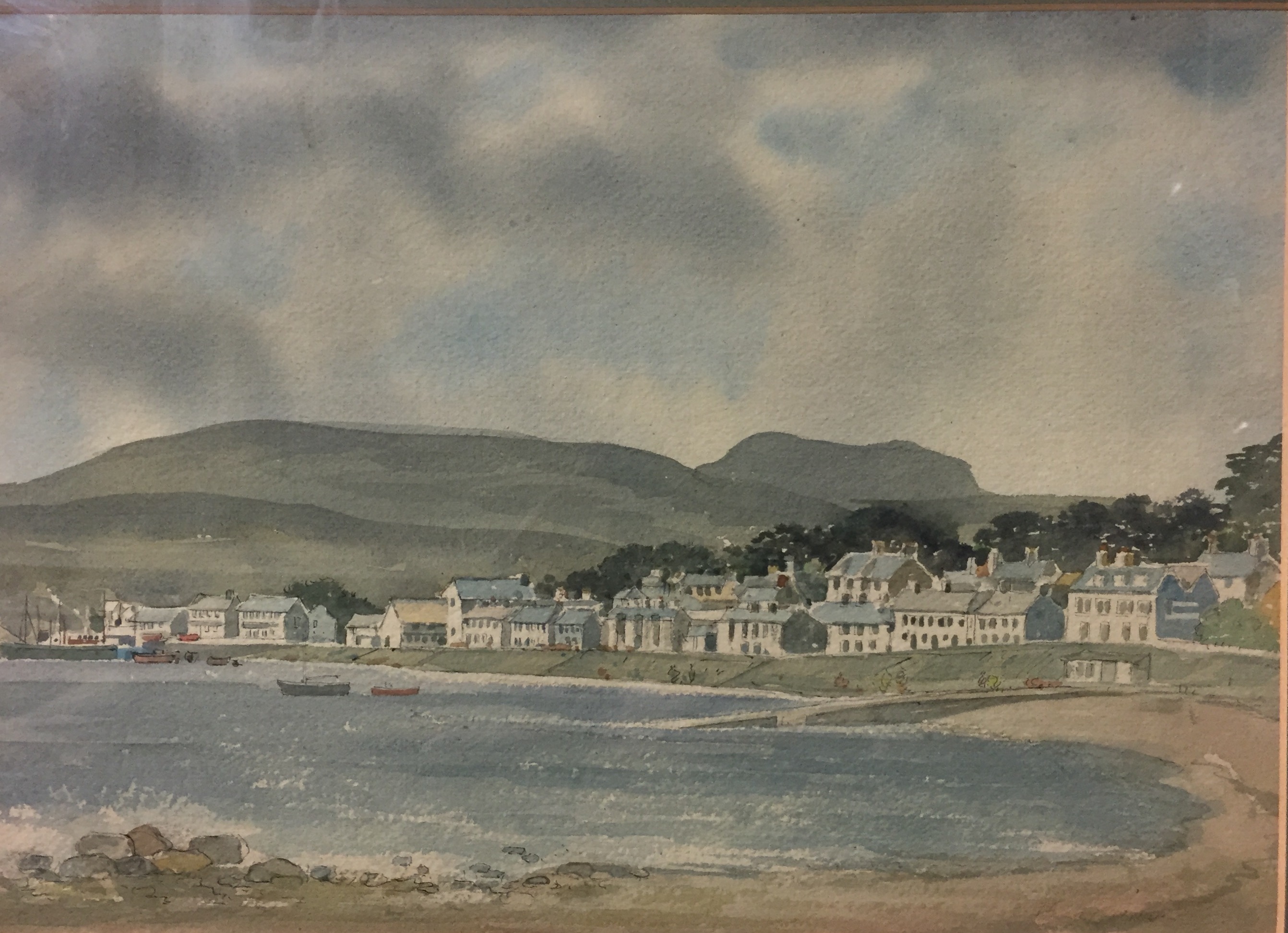 A 20TH CENTURY ENGLISH SCHOOL PEN AND WATERCOLOUR Seaside town, framed. (26cm x 38cm)