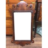 A 19TH CENTURY MAHOGANY PIER MIRROR With fret work frame and silvered plate.