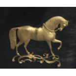 A 19TH CENTURY GILT BRONZE FIGURE OF A STALLION Mounted on a velvet background, framed and