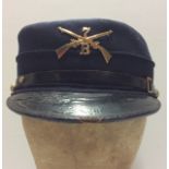 A VERY OLD U.S. PEAKED CAP, CIRCA 1890 Plus brass U.S. buckle. Condition: shows wear