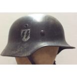 A GERMAN DECAL SS HELMET WITH DUTCH DECAL Liner and chinstrap present. Condition: distinct line