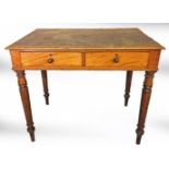 A VICTORIAN MAHOGANY SIDE TABLE Having an arrangement of two short drawers, raised on turned legs,