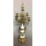 A 19TH CENTURY DESIGN BRASS AND WHITE MARBLE CANDELABRA Seven branch figured with cherubs.