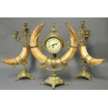 A LATE 19TH/EARLY 20TH CENTURY HIPPOPOTAMUS TUSK CLOCK & PAIR OF CANDELABRAS. (h 53cm)