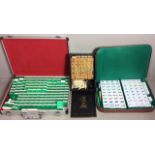 A COLLECTION OF THREE 20TH CENTURY ORIENTAL MAHJONG SETS To include a bamboo set with bone