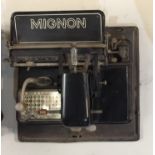 MIGNON, AN EARLY 20TH CENTURY TYPEWRITER Contained in a steel carrying case.