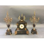 LEVI FRERES, A LATE 19TH CENTURY THREE PIECE BLACK MARBLE CLOCK GARNITURE WITH CANDELABRA.