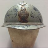 A WORLD WAR I FRENCH ADRIAN HELMET FOR ENGINEERS Liner present. Condition: paint loss but solid