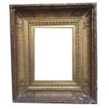 A 19TH CENTURY ENGLISH GILT PHOTOGRAPH FRAME With ribbon and fluting. (36cm x 26cm)