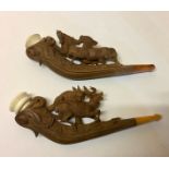 A PAIR OF 19TH CENTURY BRIER WOOD, AMBER AND MEERSCHAUM PIPES/CHEROOTS Carved in the Black Forest