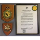 A SURRENDER DOCUMENT (FACSIMILE) AND TWO PLAQUES.