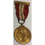 A WORLD WAR II IRISH MAHOGANY EMERGENCY MEDAL AND RIBBON. Condition: very good