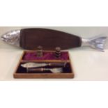 A CASED SET OF VICTORIAN SILVER PLATE AND HORN FISH SERVERS Having engraved decoration to blade