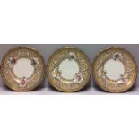 TIFFANY & CO., NEW YORK, THREE EARLY 20TH CENTURY PORCELAIN CABINET PLATES Beige borders with gilt