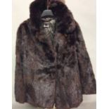 HARRODS, A VINTAGE LADIES' SHORT FUR JACKET Dark brown fur with brown silk lining and bearing '