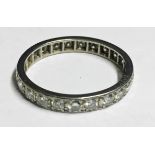 AN 18CT WHITE GOLD AND DIAMOND SET ETERNITY RING (size O).