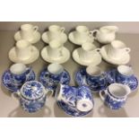 NORITAKE, A 20TH CENTURY BLUE AND WHITE PORCELAIN PART COFFEE SET Decorated with the Phoenix