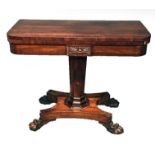 A WILLIAM IV PERIOD ROSEWOOD CARD TABLE The 'D' section fold over top with baize playing surface,