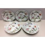 THREE EARLY 19TH CENTURY 'FOLCH' DINNER PLATES Decorated with birds amongst foliage and stamped to