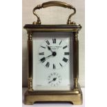 MAPPIN & WEBB, A BRASS CASED CHIMING CARRIAGE CLOCK. (11cm)