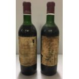 CHÂTEAU LA TOUR FIGEAC, 1970, TWO BOTTLES OF VINTAGE RED WINE Having red seal caps, bearing