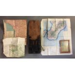 A GERMAN MAP CASE, 1935 Along with three British wartime maps, plus coloured pencils. Condition:
