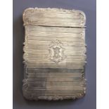 DAVID PETTIFER, A VICTORIAN SILVER CARD CASE With a foliate scrolling edge centred by a