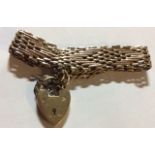 A VICTORIAN 9ct GOLD GATE BRACELET