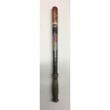 A VICTORIAN PAINTED TRUNCHEON. Condition: shows wear