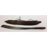 A ANTIQUE BURMESE 'DAH' SHORT SWORD Having an unclipped blade and carved bone pommel. (l 51cm)