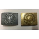 A PAIR OF BUCKLES To include Hitler Youth-Denazified and a brass naval buckle. Condition: naval