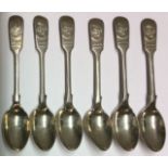 A SET OF SIX ARTIST RIFLES HALLMARKED SILVER TEASPOONS Dated from 1909 - 1912, cased.