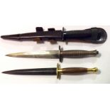 THREE FIGHTING KNIVES To include two 3rd pattern styled and one decorative knife. Condition: good,
