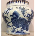 A 17TH CENTURY CHINESE TRANSITIONAL PERIOD BLUE AND WHITE BALUSTER VASE Hand painted with a Kylin