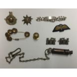 A MIXED LOT OF GERMAN, U.S. AND BRITISH ITEMS Comprising a 1918 whistle, bullion para wing,