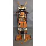 A 1950'S/1960'S SET OF SAMURAI ARMOUR IN PRESENTATION BOX Given to overseas dignitaries upon