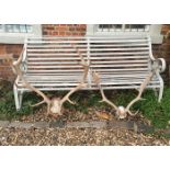 AN EARLY 20TH CENTURY PAIR OF LARGE ANTLERS. (largest set measuring w 90cm)
