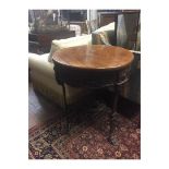 A PAIR OF IRON ART NOUVEAU STYLE CIRCULAR CAFE/PUB TABLES With carved stylized floral decoration and