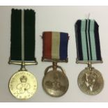A HIMALAYAN DEFENCE MEDAL (NEPAL) AND A WORLD WAR II INDIA SERVICE MEDAL Plus one other.